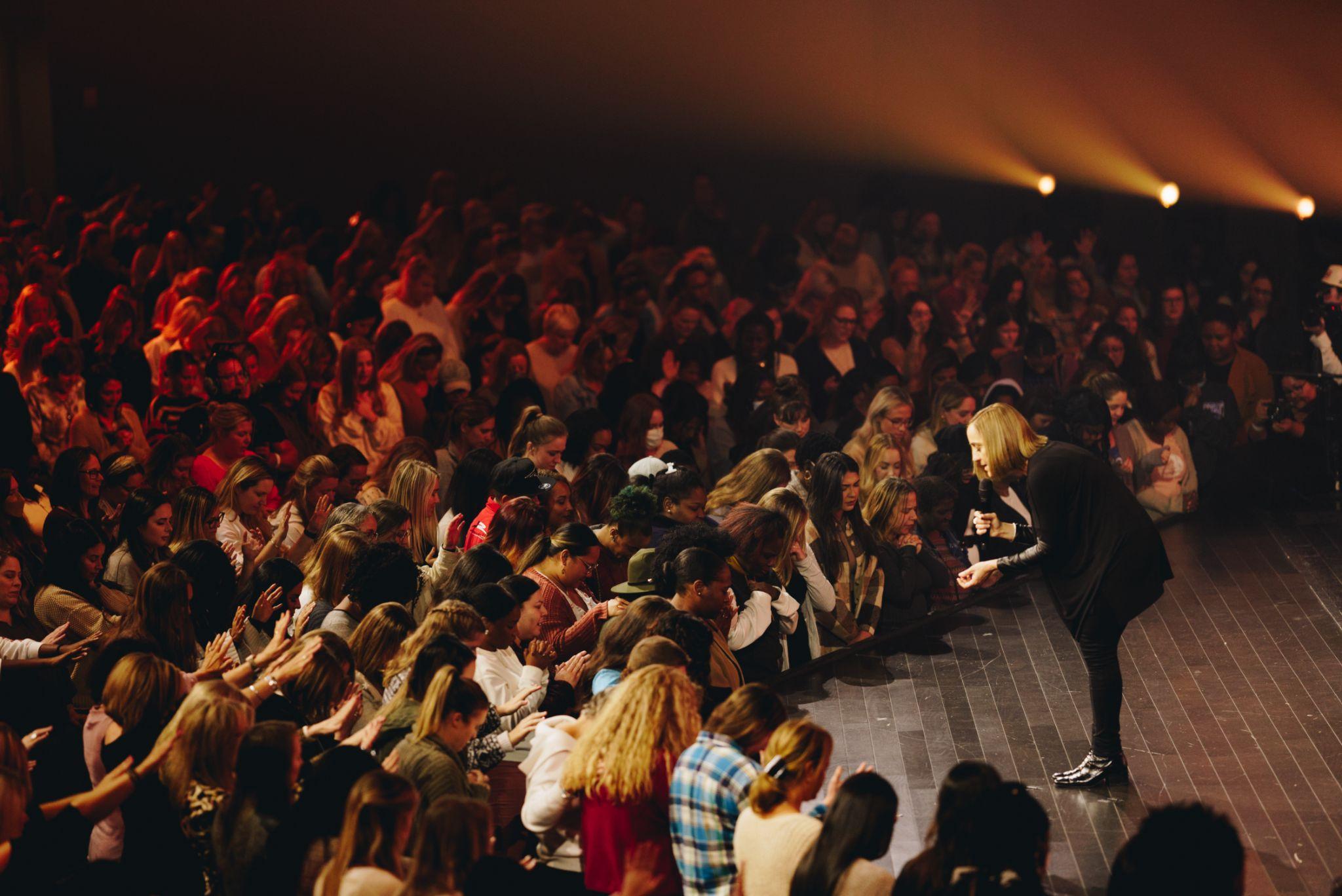Christine Caine speaking to a full room