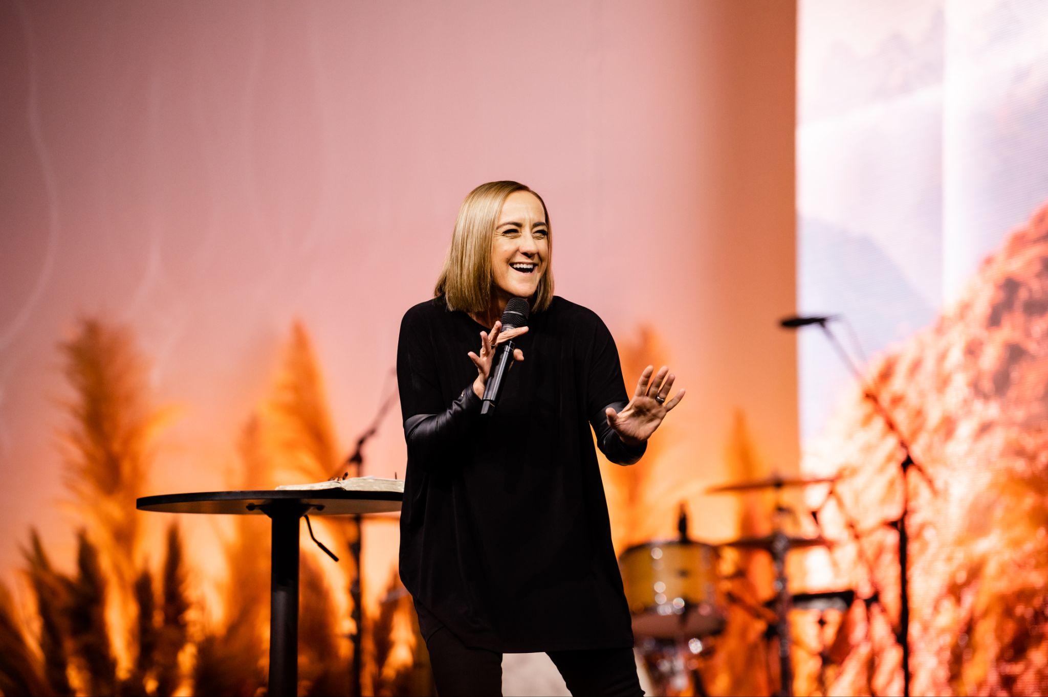 Christine Caine speaking on stage